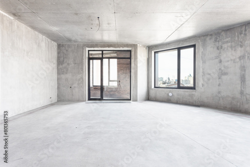 interior of the apartment without decoration in gray colors. rough finish