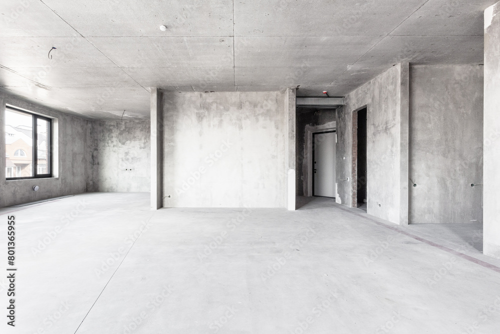 interior of the apartment without decoration in gray colors. rough finish