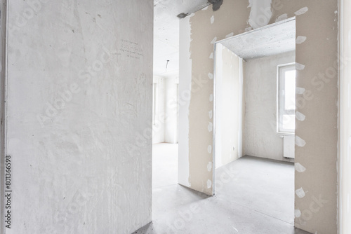 interior of the apartment without decoration in gray colors. rough finish