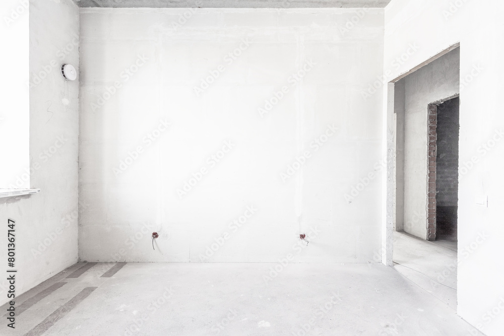 interior of the apartment without decoration in gray colors. rough finish interior of the apartment without decoration in gray colors. rough finish