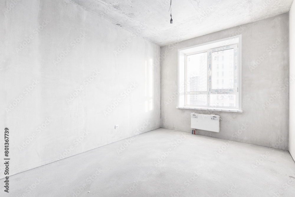 interior of the apartment without decoration in gray colors. rough finish interior of the apartment without decoration in gray colors. rough finish