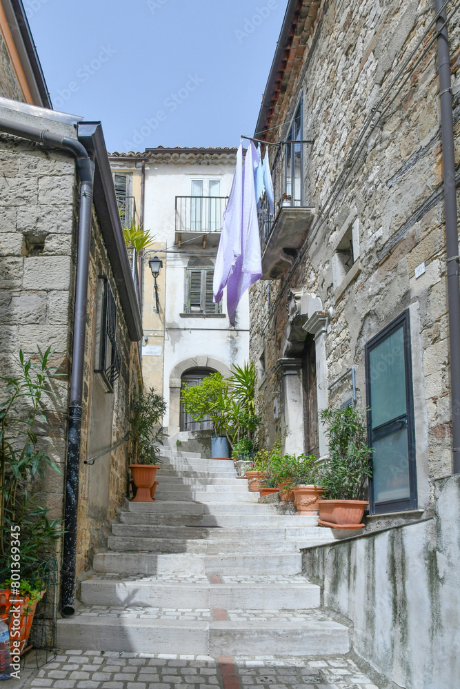 A street among the old houses of Pietracatella, a medieval village in Molise, Italy.