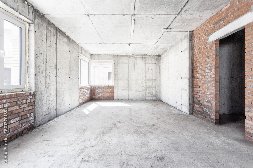 interior of the apartment without decoration in gray colors. rough finish interior of the apartment without decoration in gray colors. rough finish