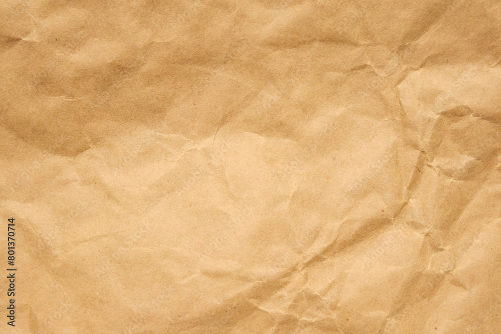 Abstract crumpled and creased recycle brown paper texture background