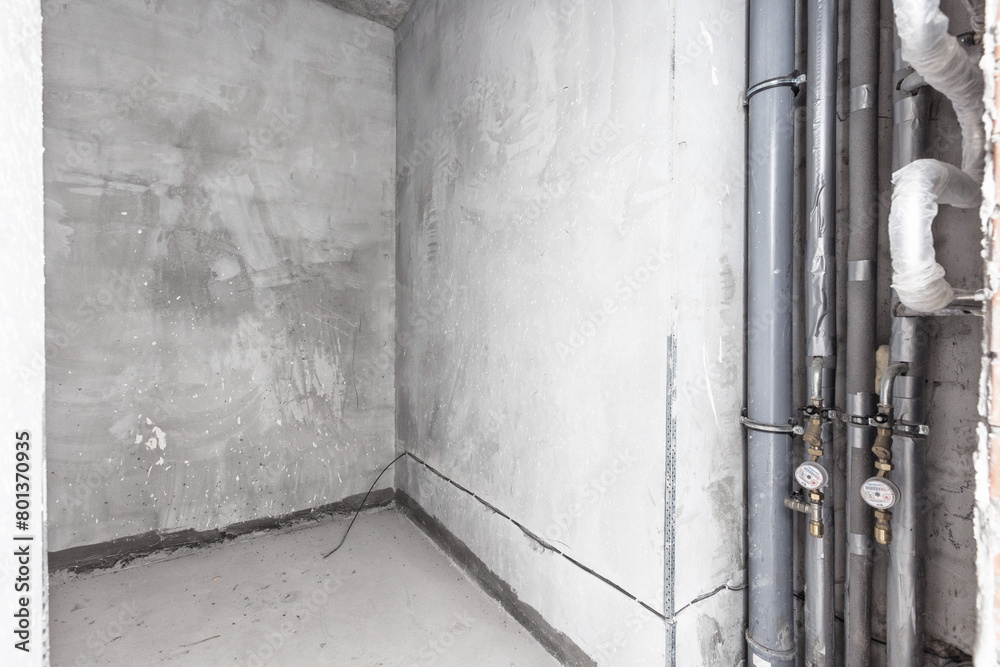 interior of the apartment without decoration in gray colors. rough finish interior of the apartment without decoration in gray colors. rough finish