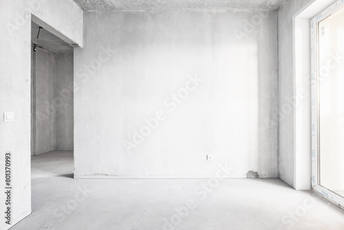 interior of the apartment without decoration in gray colors. rough finish