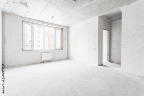 interior of the apartment without decoration in gray colors. rough finish