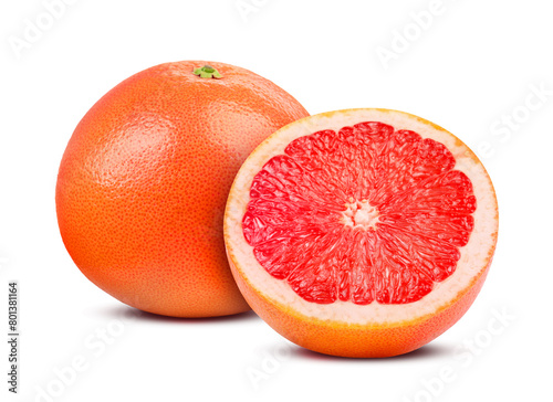 Fresh whole and cut grapefruits isolated on white