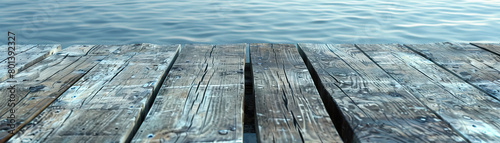 Weathered Wooden Dock: Close-Up of Textured Wooden Dock with Coastal Charm photo