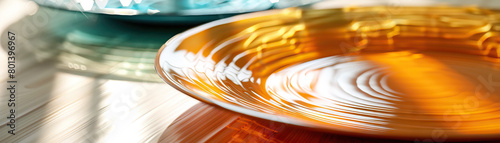 Glazed Ceramic Plates: Close-Up of Shiny and Textured Glazed Ceramic Plates in Table Setting