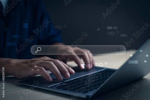concept of technology search engine optimization,SEO and job search tools.Close-up of man using computer showing information search and global big data connection with search bar