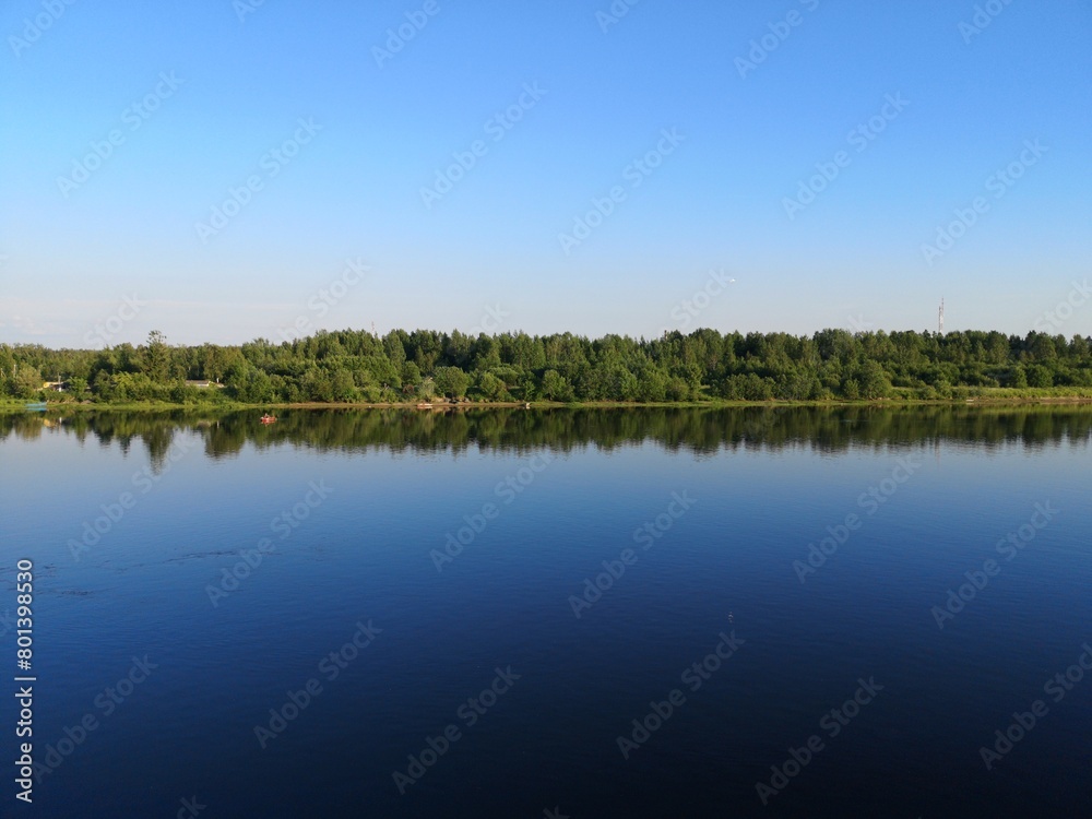 reflection of trees in the water reflection of trees in the water