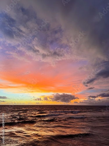 Sunset sky. Nature beautiful Light Sunset or sunrise over sea Colorful dramatic majestic scenery sunset Sky with Amazing clouds and waves in sunset sky purple light cloud background. Bali. ocean