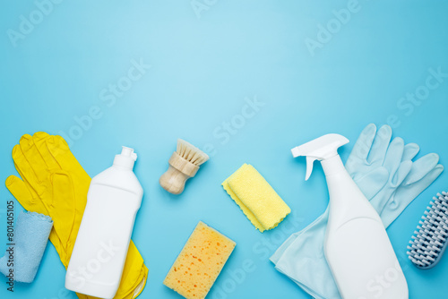 Various accessories cleaning products  sprays  rags  sponges and brushes. Top view  flat lay  copy space