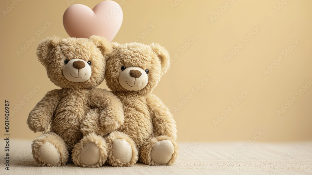Fototapeta premium Two Teddy Bears with a Heart-Shaped Balloon on a Light Beige Background with Copy Space 
