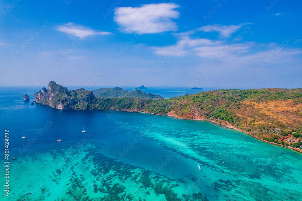 Fototapeta premium Amazing travel photo Thailand tropical paradise by drone. Aerial view Phi Phi island, Krabi Province