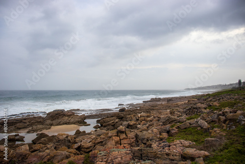A view of the ocean on a cloudy day at the south coast, located at Orange rocks, Margate.