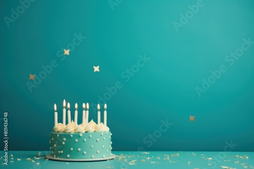 Teal background with birthday cake with candles pastel backdrop empty blank copyspace for design text photo website web banner backdrop texture 