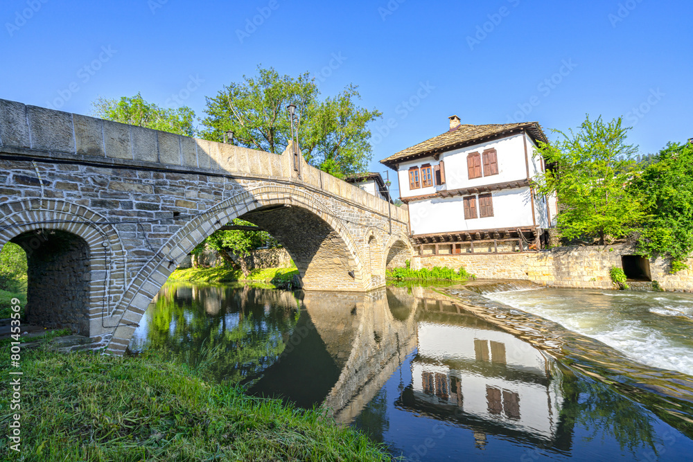 The old bridge and traditional Bulgarian houses in the old town of Tryavna, Bulgaria