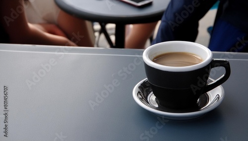 a cup of coffee on a table