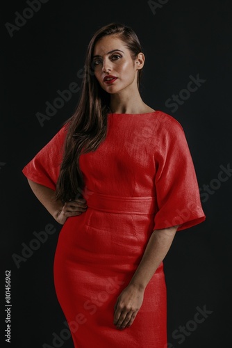 Woman wearing red dress, studio shoot