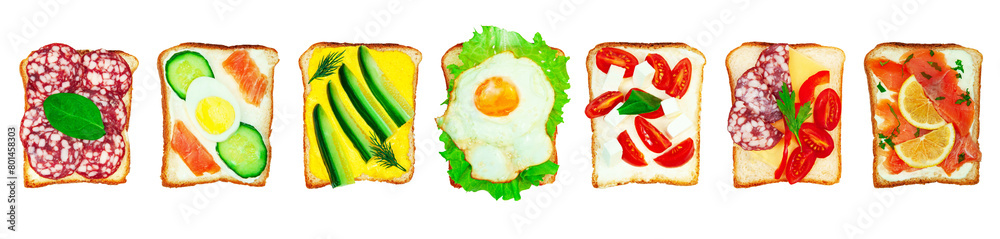 different sandwiches in a row on a white background. canapés with vegetables, sausage and fish on a white texture different sandwiches in a row on a white background. canapés with vegetables, sausage and fish on a white texture