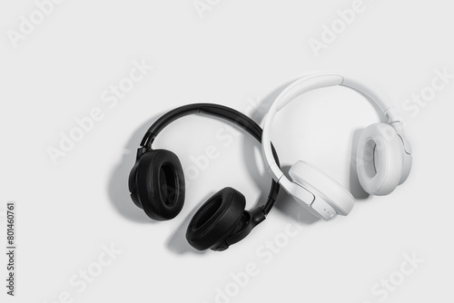 two pairs of headphones on a white background