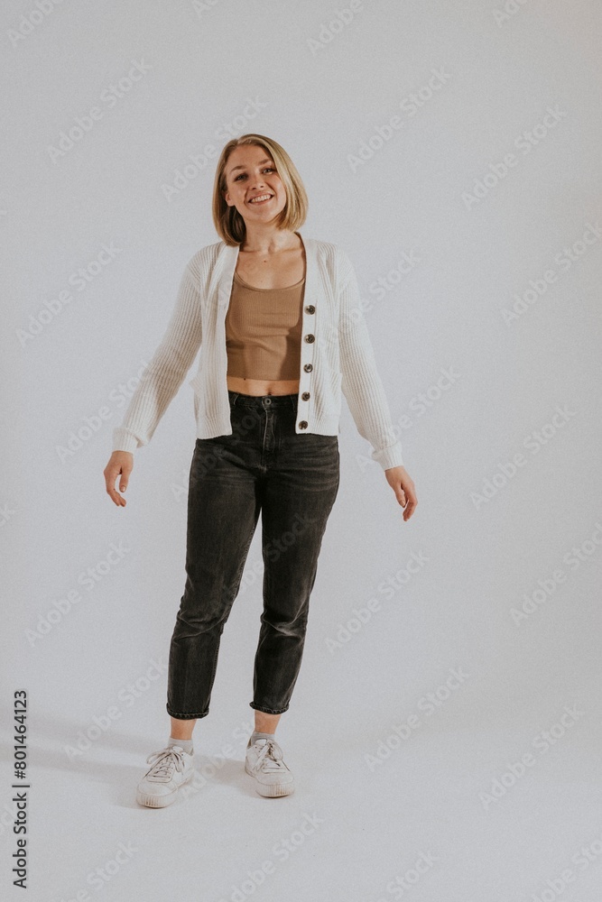 Women's casual outfit, crop top, jeans and cardigan Women's casual outfit, crop top, jeans and cardigan