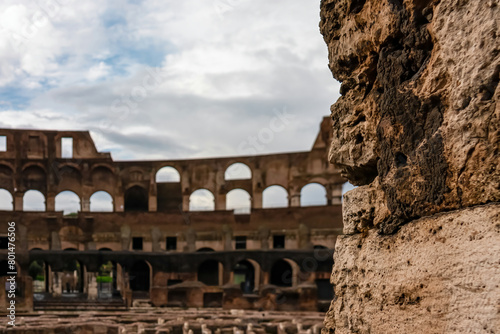Obraz na płótnie Selective focus on wall with blurred view on interior of famous Colosseum of city Rome, Lazio, Italy, Europe. UNESCO World Heritage Site. Flavian Amphitheater the symbol of ancient Roma, Roman Empire w salonie