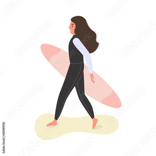 A woman in a black wetsuit stands confidently with her surfboard under her arm on a sandy beach, ready to surf.