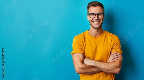 Smiling Man in Yellow T-Shirt