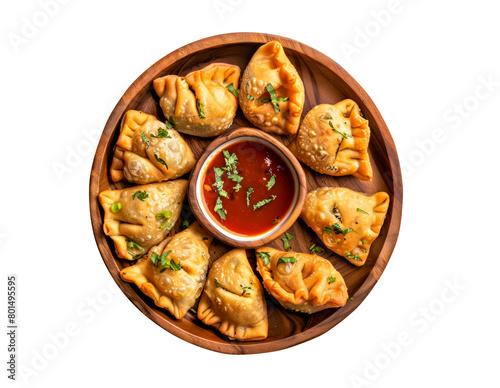 Traditional empanadas with tomato sauce isolated on white background. Top view.