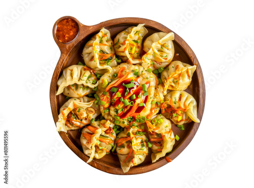 Meat dumplings in a wooden plate isolated on white background.