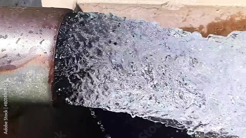 Tube Well Water. Water is coming out from a Tube Well. Irrigation water flow from pipe for agriculture fields. slow motion water flash. Beautiful 4k footage.