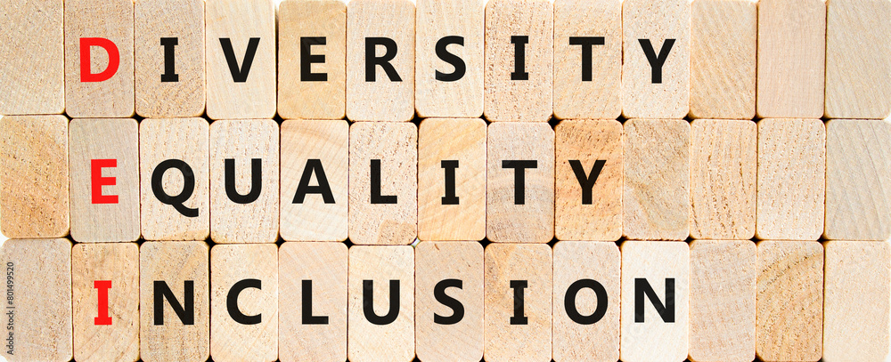 DEI diversity equality inclusion symbol. Concept words DEI diversity equality inclusion on blocks on beautiful wooden background. Business DEI diversity equality inclusion concept. Copy space.
