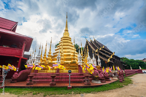 Beautiful Ancient golden color Pagoda in the Phan Tao temple  is a Buddhist temple in the historic centre tourist attraction an ancient Thai art and is Public places in Chiang Mai,Thailand.