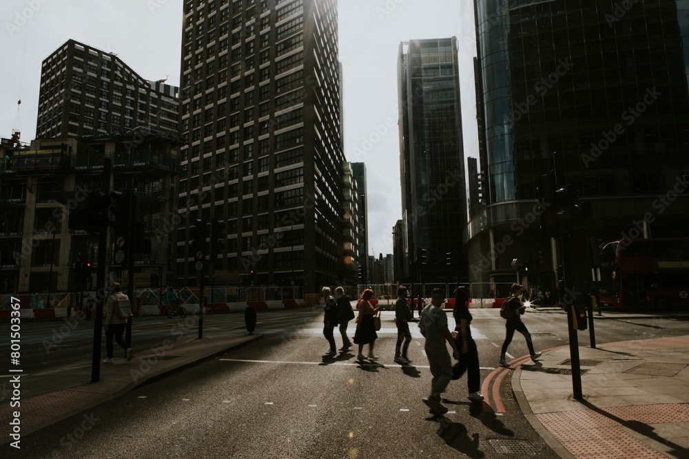 People crossing road in city photo