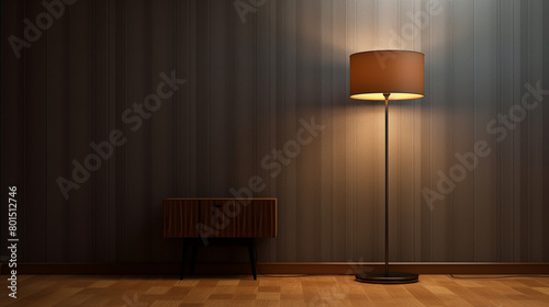 A sleek, modern lamp casting a warm, inviting light in an otherwise dark and empty room with clean lines. photo