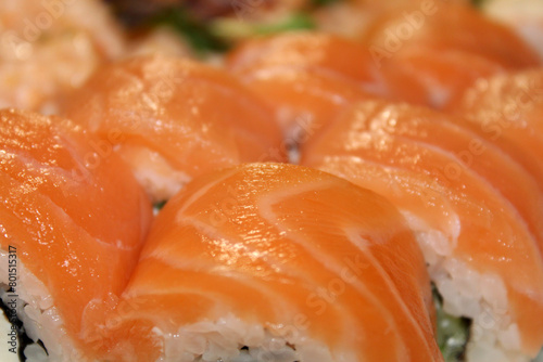 Stock photo of Philadelphia sushi roll. High quality image of salmon sushi. Fast food with place for text and blur.