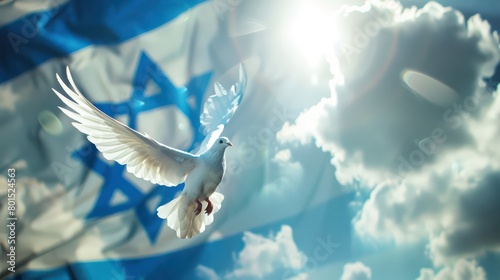 A white dove flying in the sky against the backdrop of the waving Israeli flag. Israel independence day photo