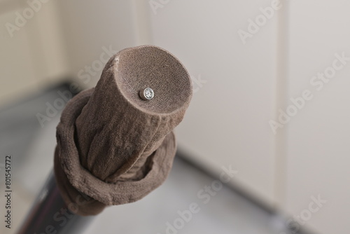 Lifehacks; Pop a stocking over the head of your vacuum cleaner to find small, missing items       photo