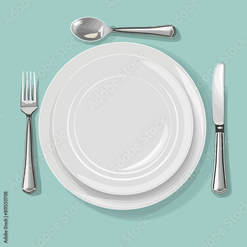 a white plate with a knife and fork