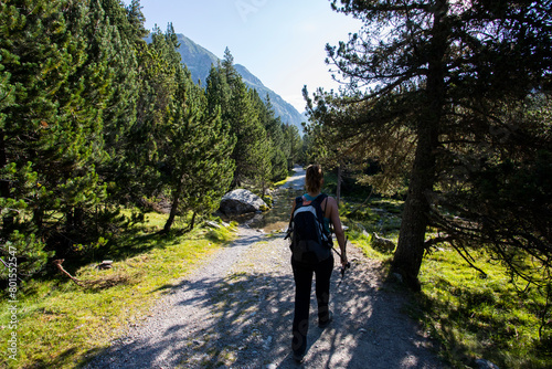 Young hiker woman in Vall de Boi  Aiguestortes and Sant Maurici National Park  Spain