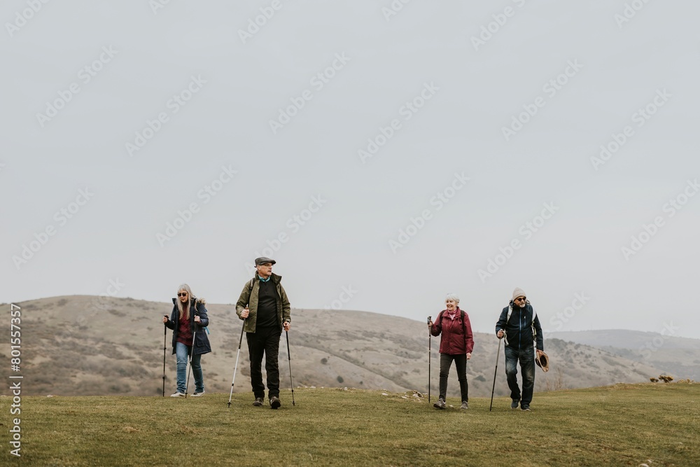 Senior hikers walking, nature travel photo