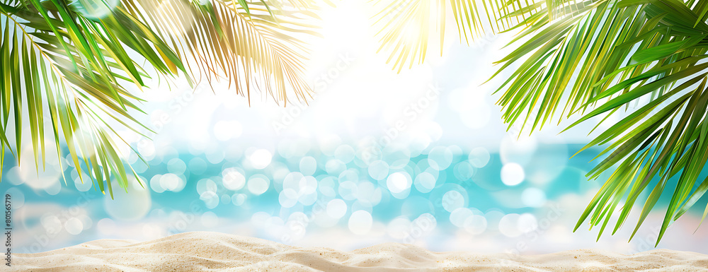 Summer background with tropical palm leaves and sandy beach background banner for summer vacation travel concept Summer background with tropical palm leaves and sandy beach background banner for summer vacation travel concept