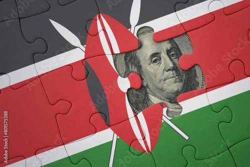 puzzle with the national flag of kenya and usa dollar banknote. finance concept