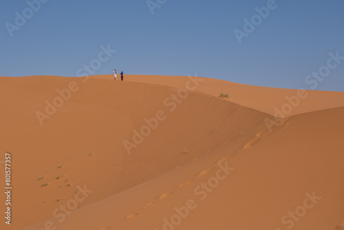 person in the sand dunes Morocco 