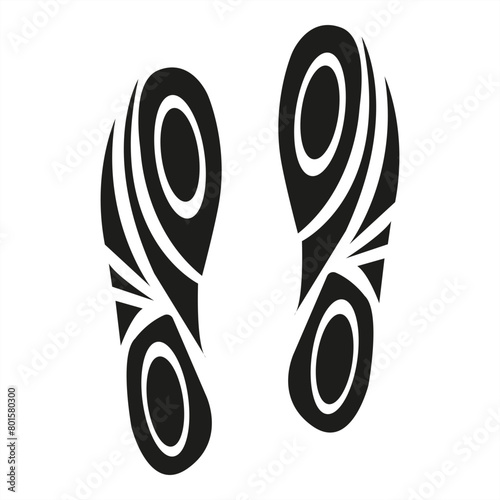 The image is of two black and white feet with a wave pattern