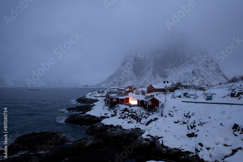 fog over the mountain in hamnoy norway photo