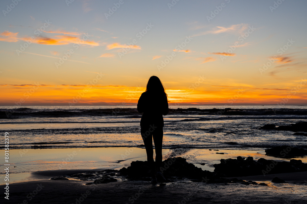 woman at sunset on the beach